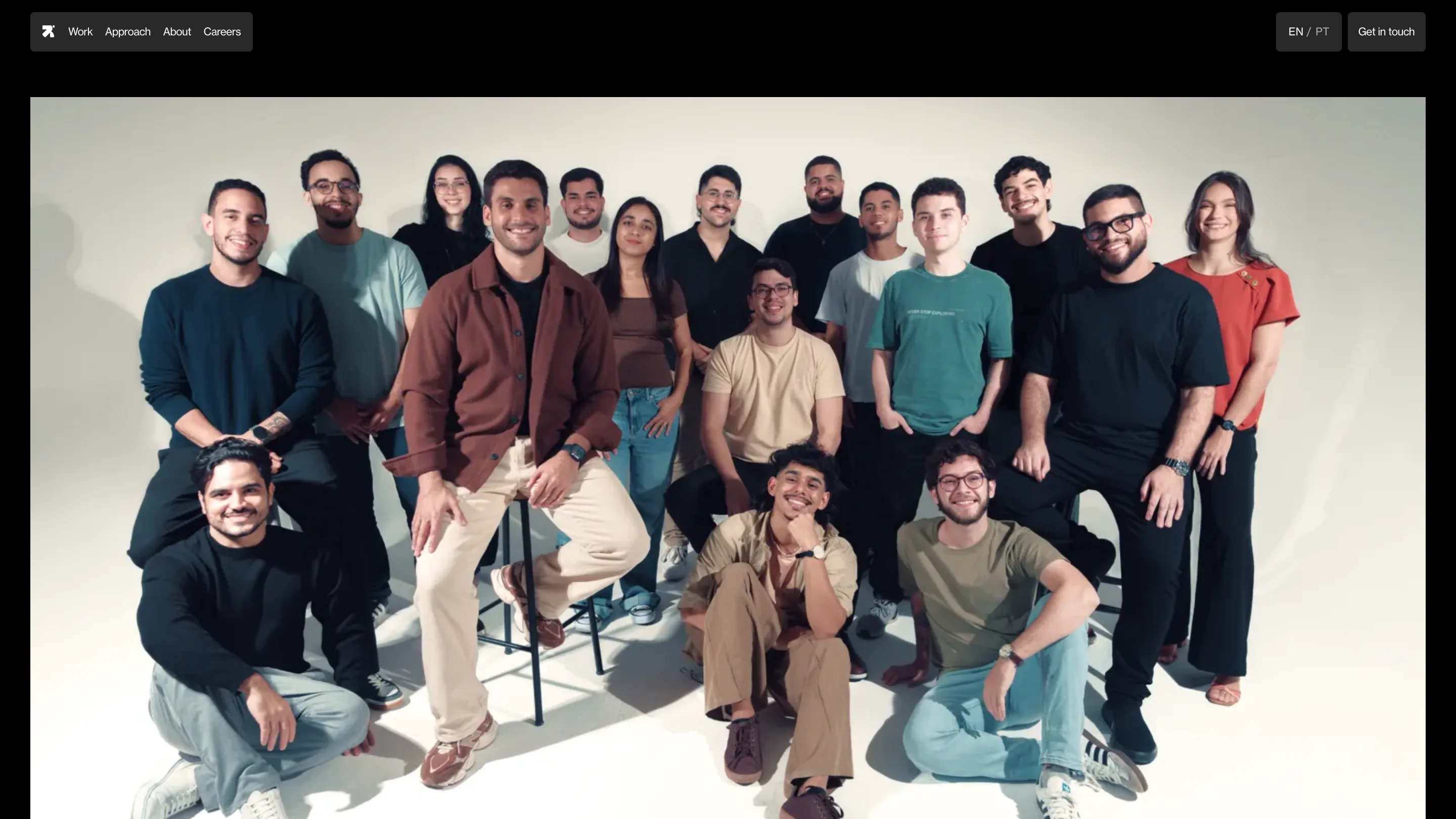 Revelatio's about page: the full studio team on a bright backdrop