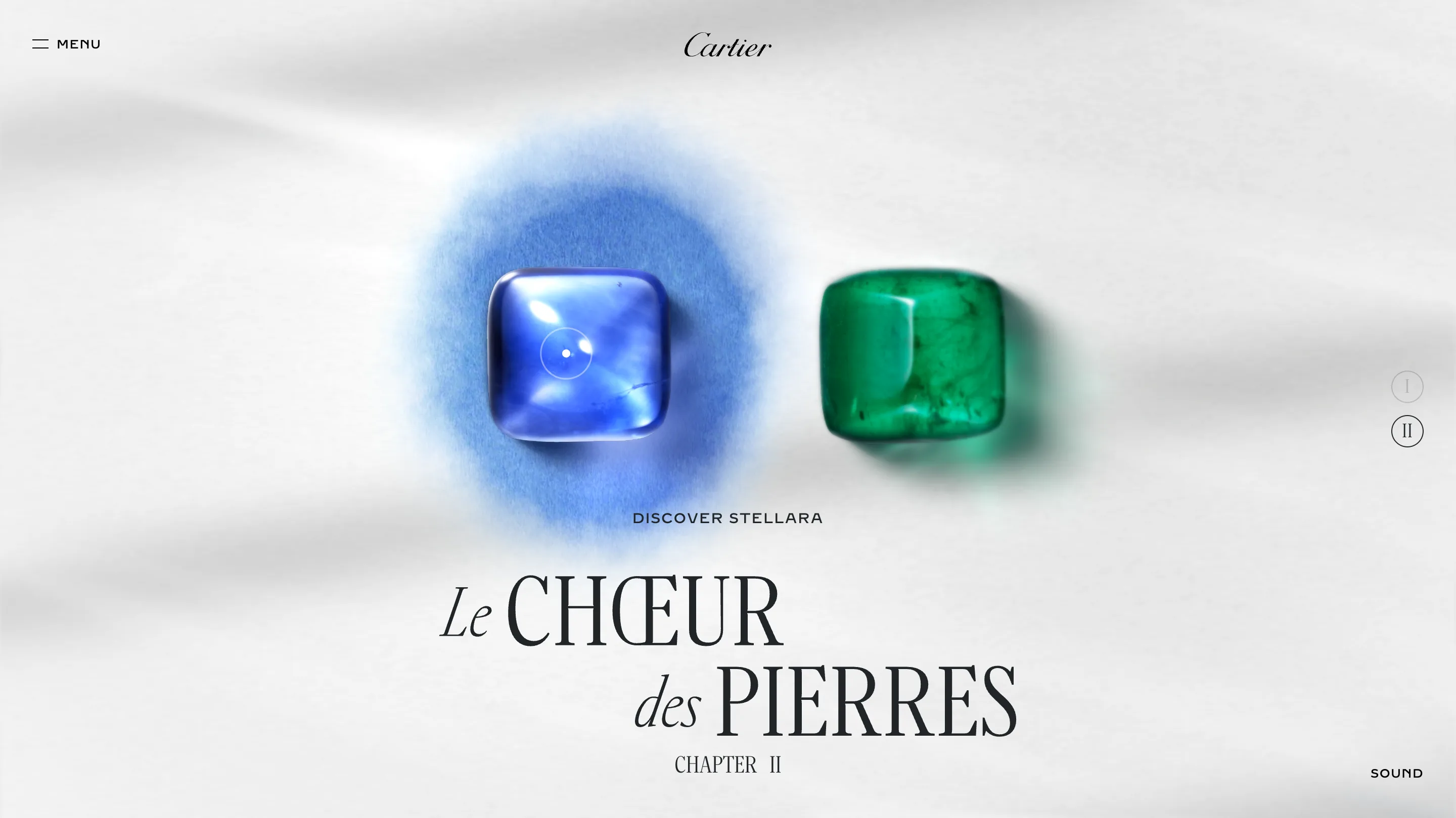 A blue sapphire and a green emerald cabochon on grey silk above the title Le Chœur des Pierres, with a blue halo around the sapphire