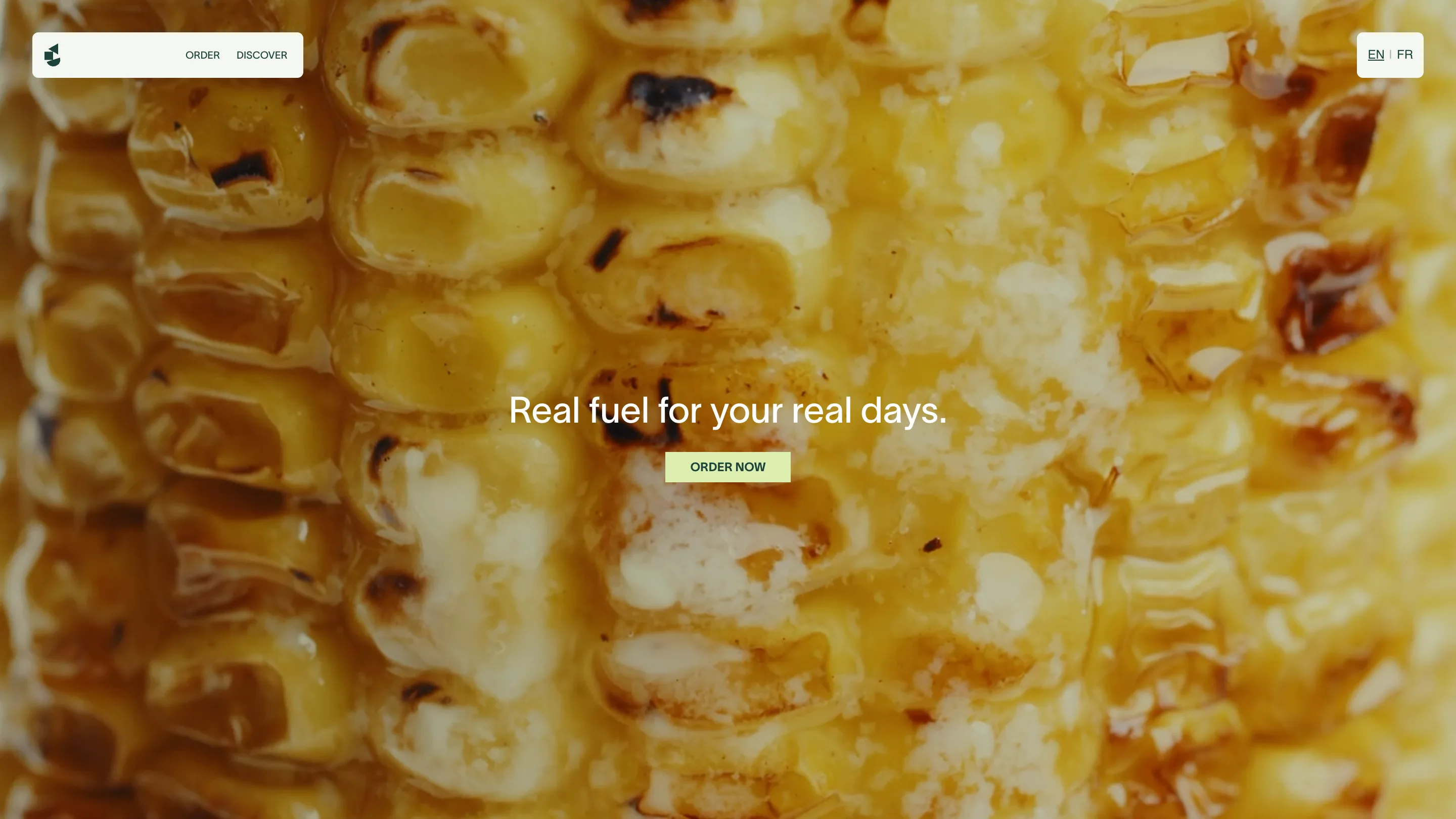 The menu page: a full-bleed charred corn image with the line real fuel for your real days and an order now button