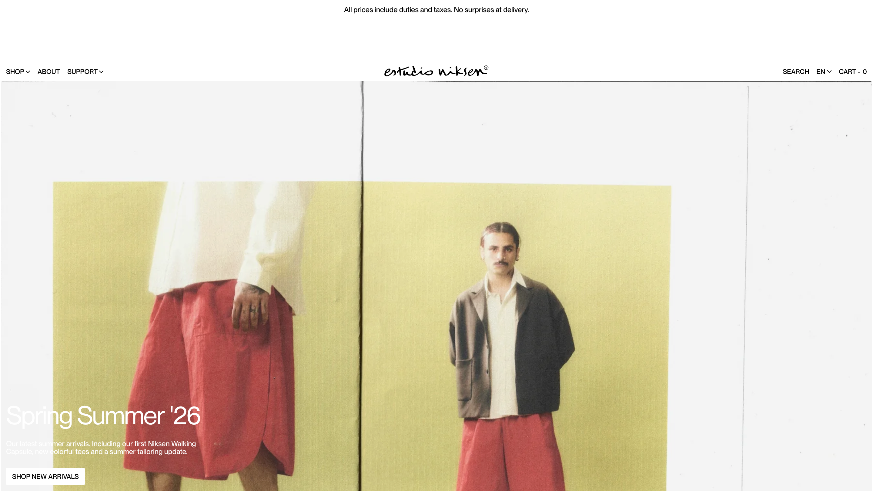 Screenshot of the Estudio Niksen homepage: a scanned magazine spread of two models in red shorts against a pale yellow wall, with a handwritten signature wordmark centred in the header above it