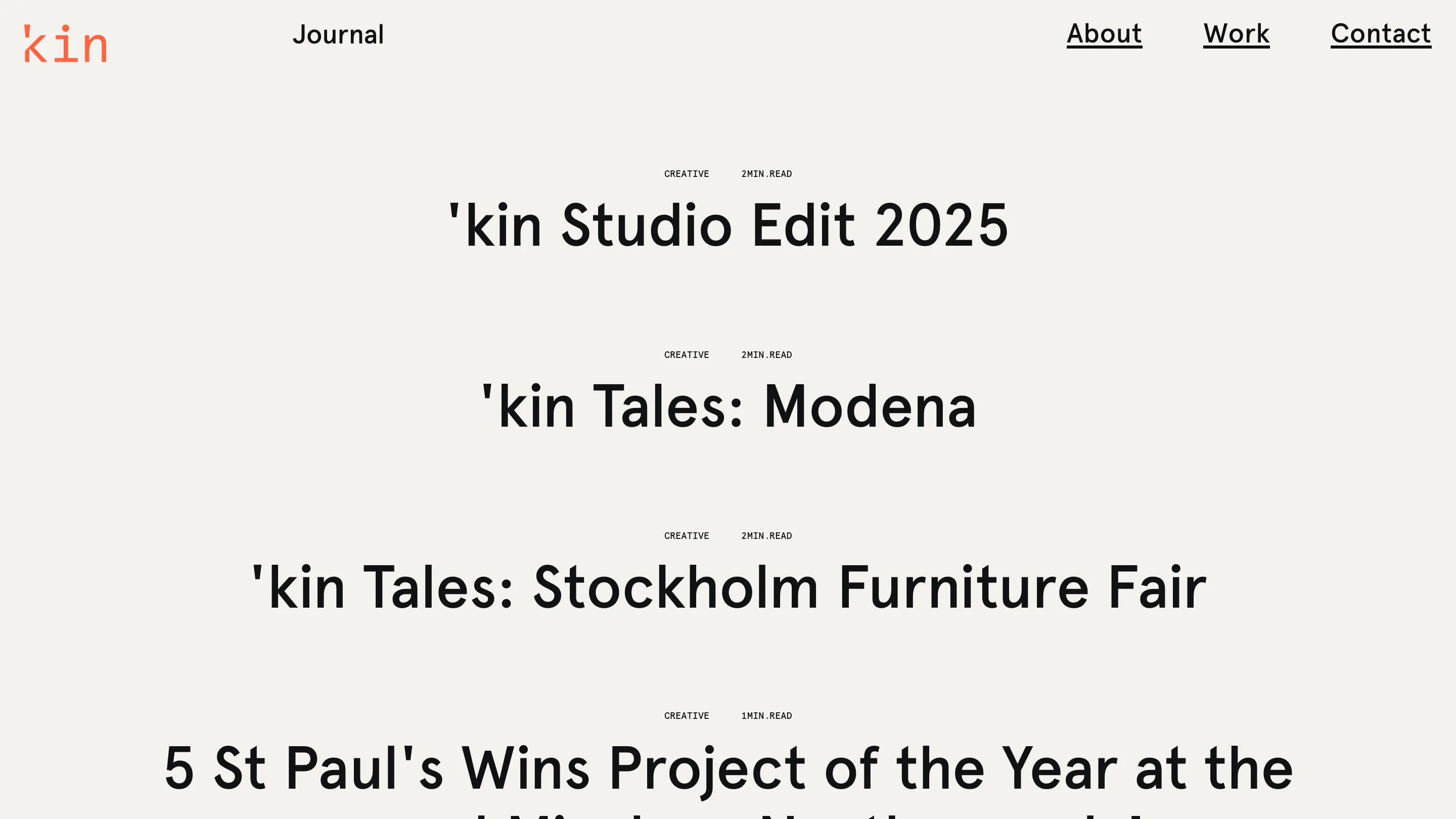 The 'kin journal: centred headlines with monospace category and read-time tags, no images